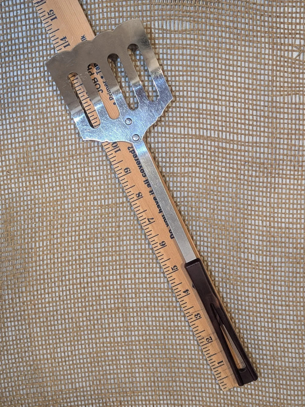 Vintage Stanhome Slotted Metal Turner with Marbled Brown Handle